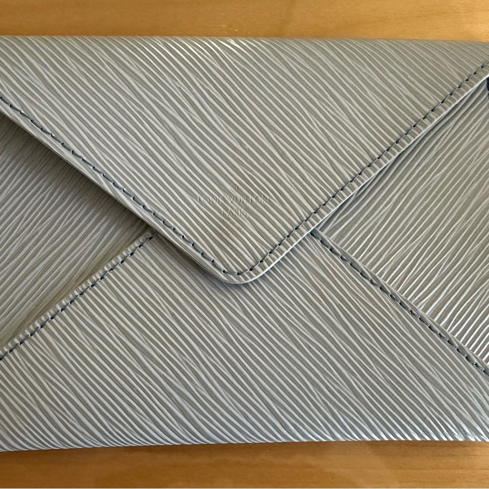 Louis Vuitton Textured Envelope Pochette in light blue